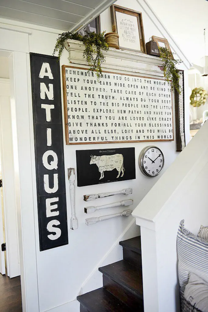 farmhouse-style stairway gallery wall