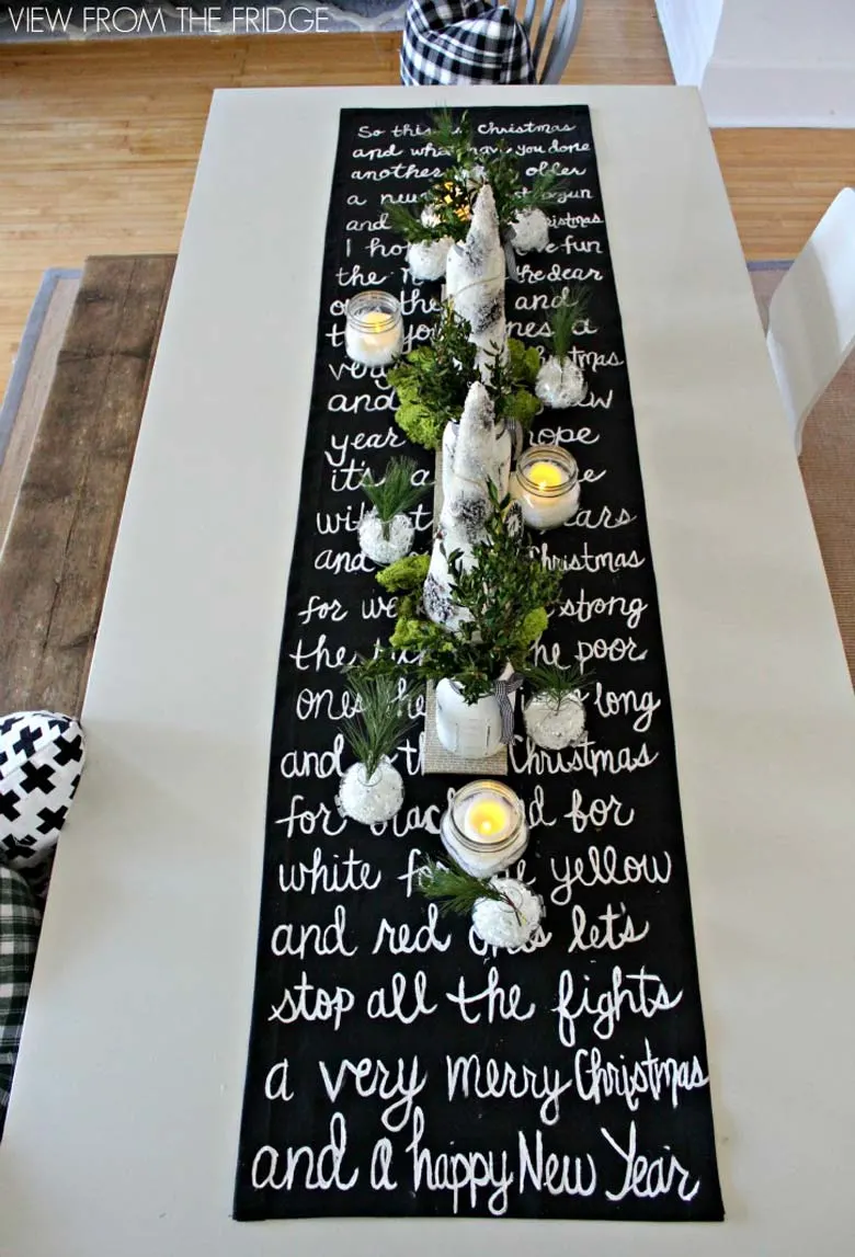 how to decorate a small living room for christmas - DIY black and white table runner #smallspaces #tinyhouseliving #smallspaceliving #DIYchristmasdecor #christmasdecorideas #DIYtablerunner #diychristmasproject