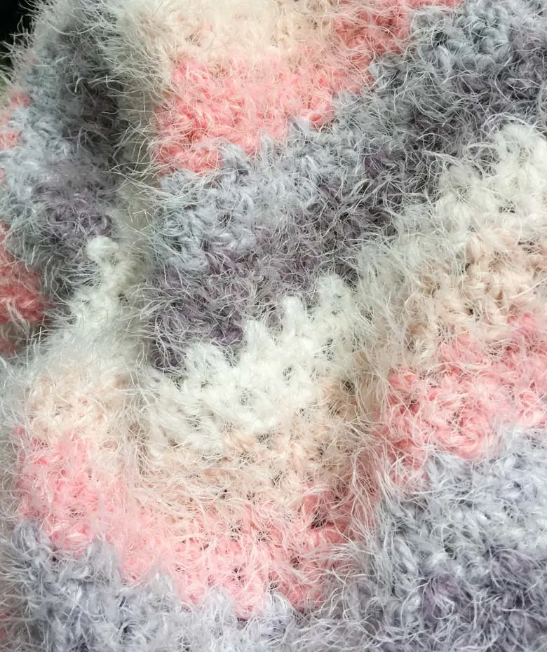 Learn how to Crochet V-stitch blanket with easy beginner crochet pattern, learn to crochet v stitch, easy crochet stitch for blankets, how to crochet step by step #freecrochetpattern #caroncakespattern #caronlattercakesyarn, #crochetvstitch #howtocrochetstepbystep #toddlerblanket #basiccrochetstitch